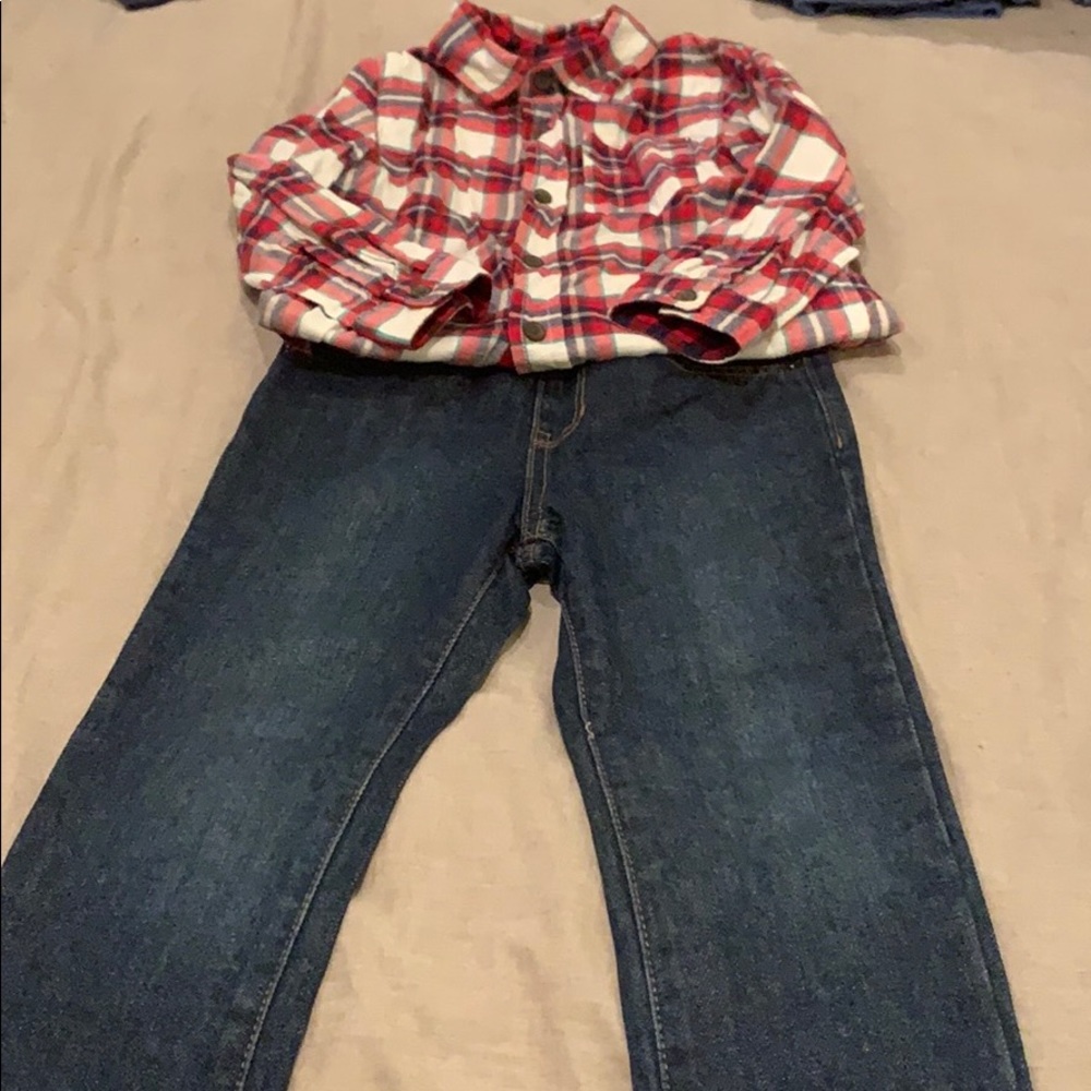 Jeans and plaid button down shirt